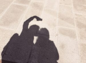 silhouette photo of man and woman kissing